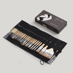 A 30-piece expert paint brush set displayed in a black nylon cloth roll with various brush types including liner, flat, angular, filbert, round, fan, and comb, alongside a canvas roll and palette knife. The set appears to be of high quality with bristles visible and securely attached to the handles.